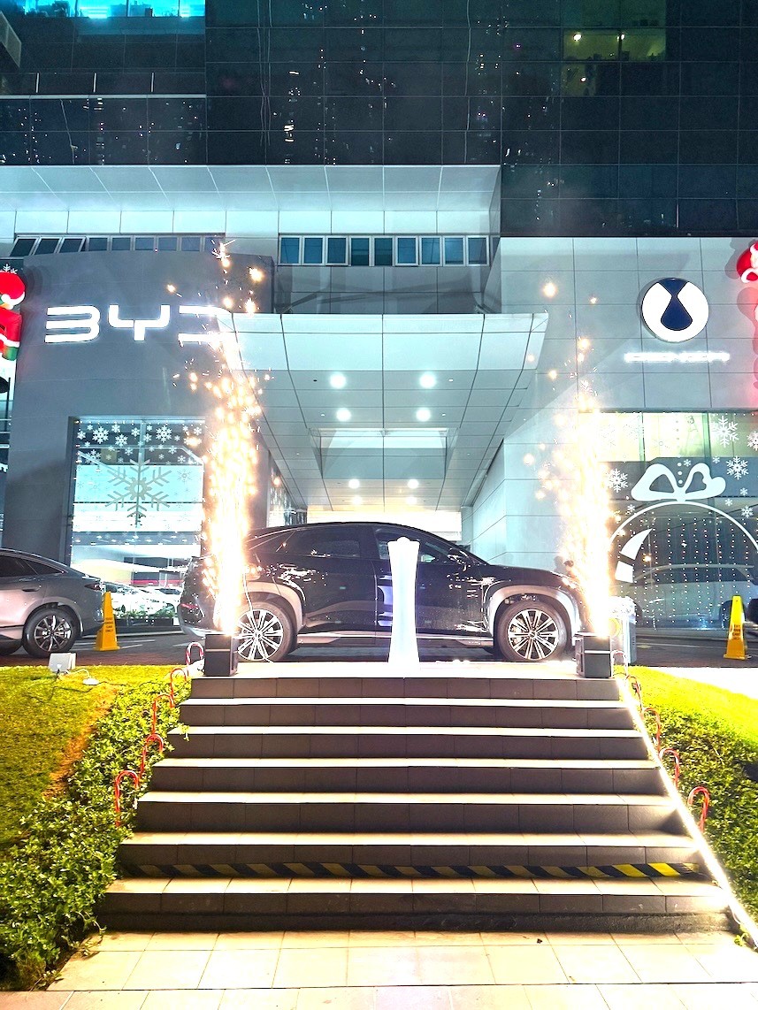 Cold spark fountain launch mechanism Singapore BYD car unveiling event night