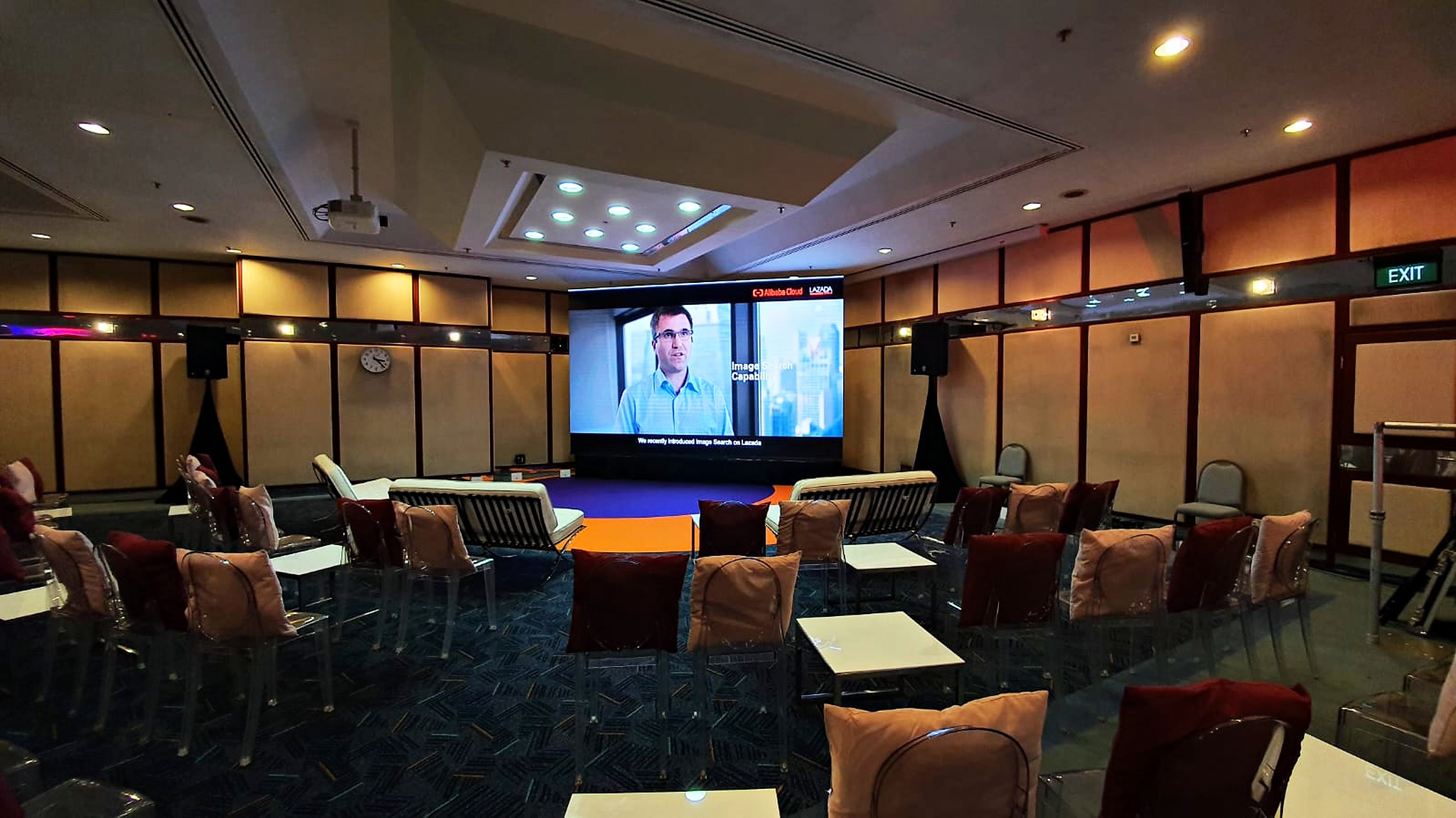 Movie Screening: 6 Easy Ways to Plan Better Seating 1 Movie Screening: lounge seating arranged towards an indoor projection screen